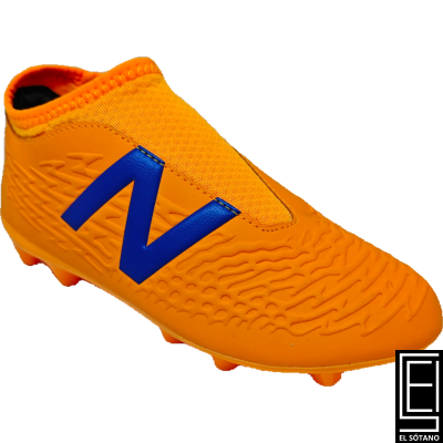 Tacos New Balance Tekela V3 Magique Junior Fg En Color Naranja Vibrante