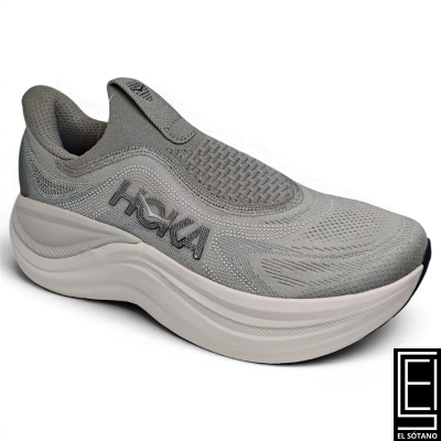Zapatos Hoka Skyward Laceless En Color Gris Caracterizados Por Su Diseño Sin Cordones Estilo Calcetín Y Una Entresuela De Máxima Amortiguación